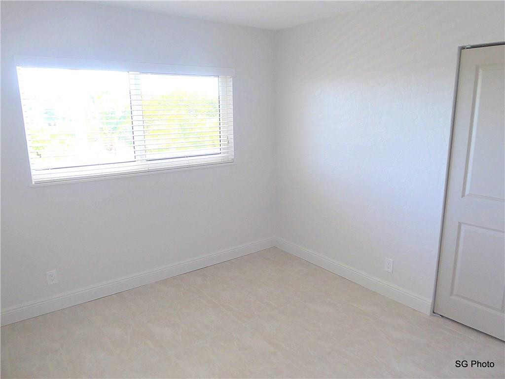 611 East Woolbright Road, Unit 407 Boynton Beach, FL 33435 - Photo 19 of 22 an empty room with a window