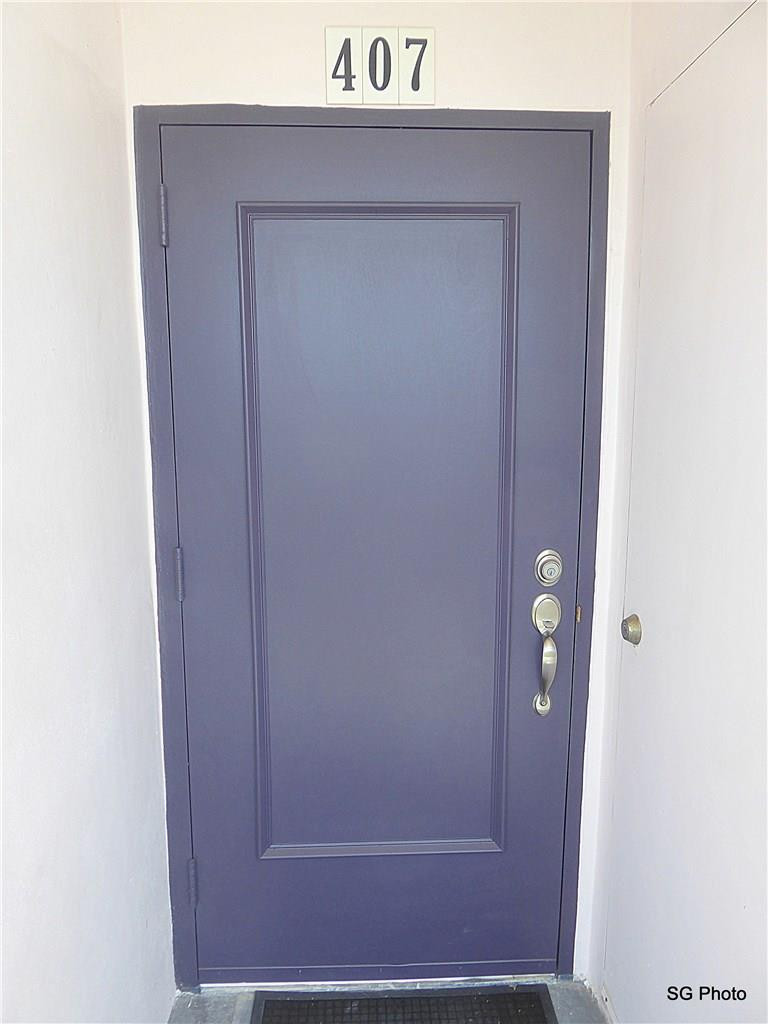 611 East Woolbright Road, Unit 407 Boynton Beach, FL 33435 - Photo 22 of 22 a view of front door