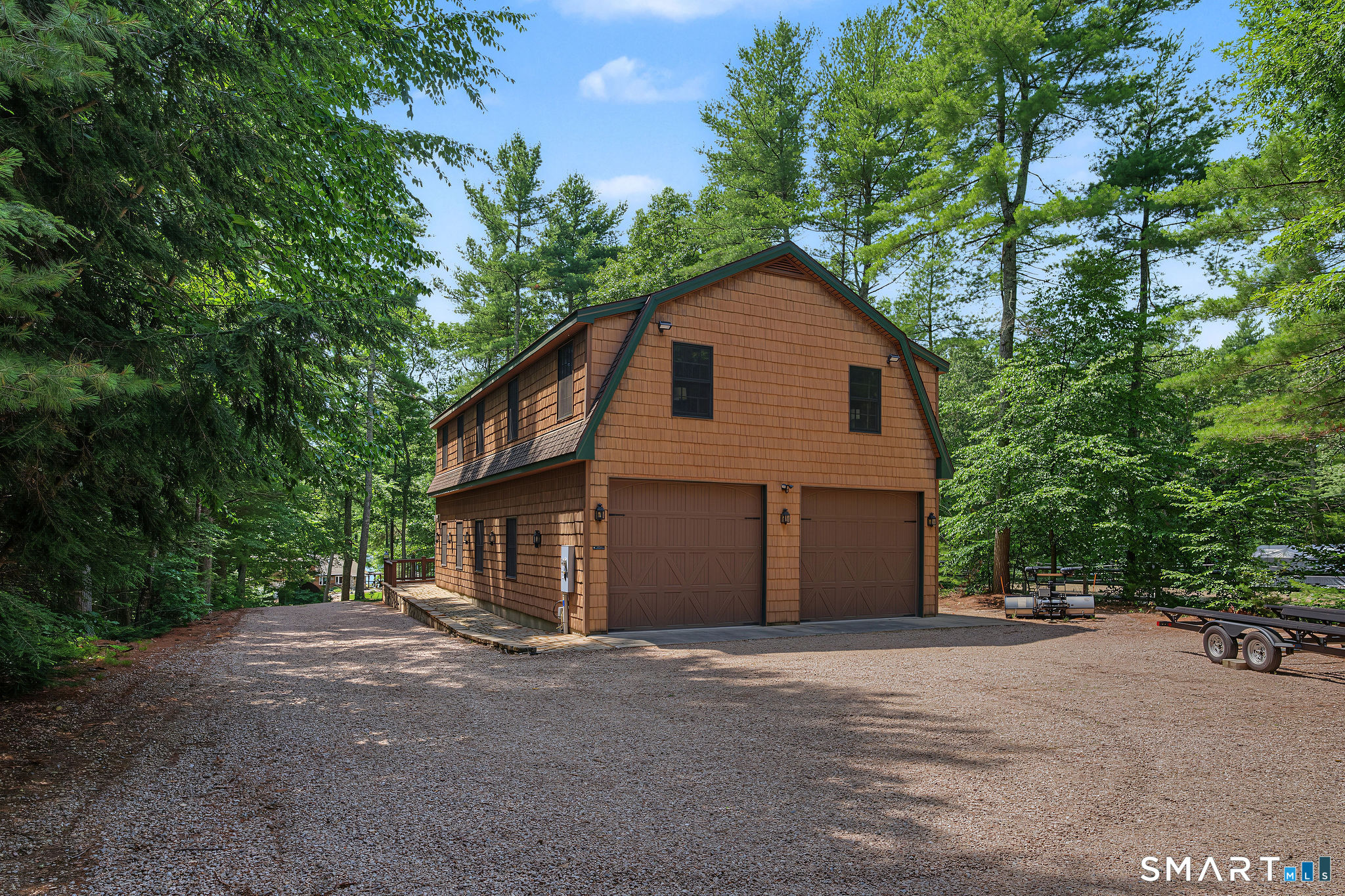 174 North Shore Road Voluntown, CT 06384 - Photo 27 of 39 with oversized garage doors for storing pontoon boat
