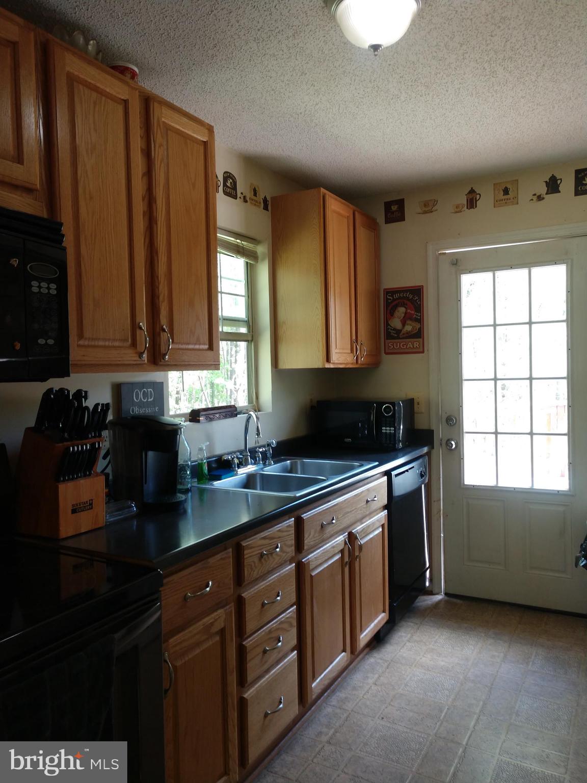 Galley Kitchen Leading to Rear Deck