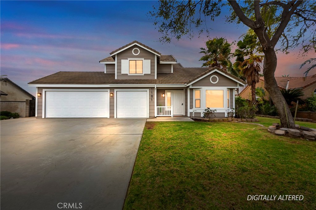 1181 West Banyon Street Rialto, CA 92377 - Photo 1 of 1 a front view of a house with a yard