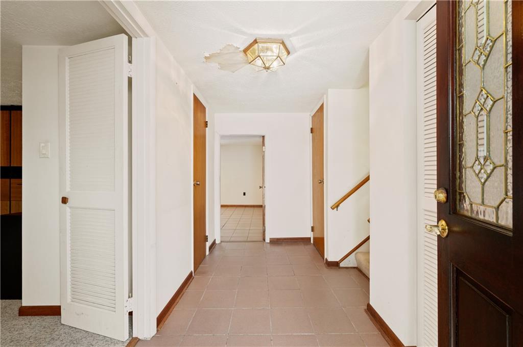 154 North Jamestown Road Coraopolis, PA 15108 - Photo 2 of 25 a view of a hallway with interior of the house