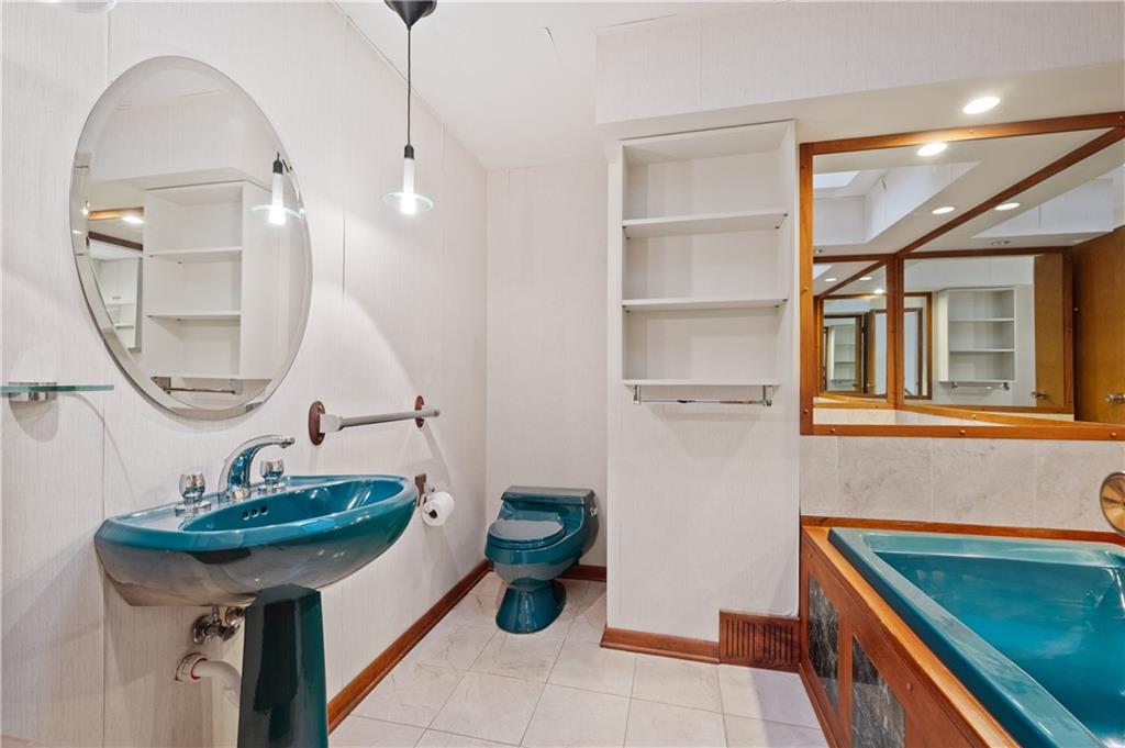 154 North Jamestown Road Coraopolis, PA 15108 - Photo 21 of 25 a bathroom with a sink and a mirror