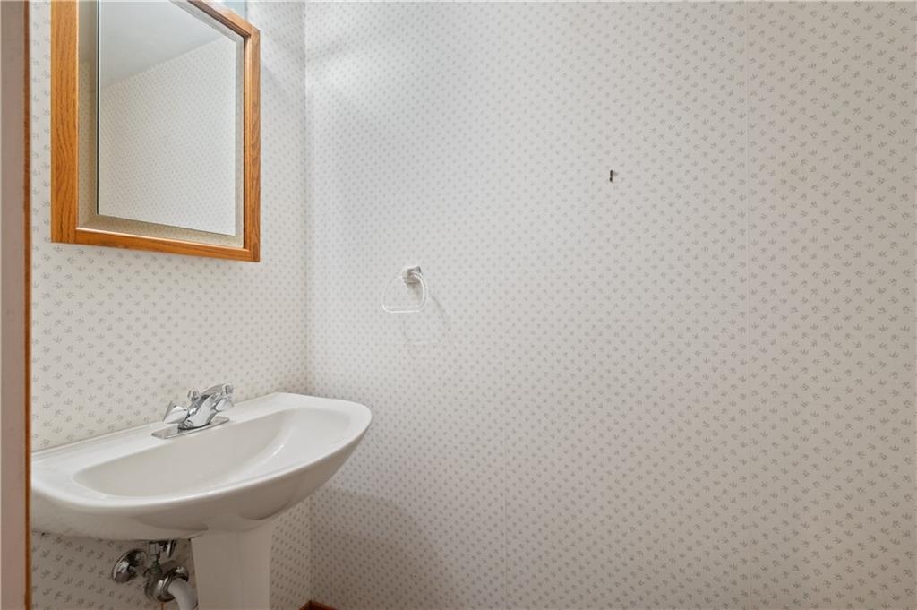 154 North Jamestown Road Coraopolis, PA 15108 - Photo 3 of 25 a bathroom with a sink and a mirror