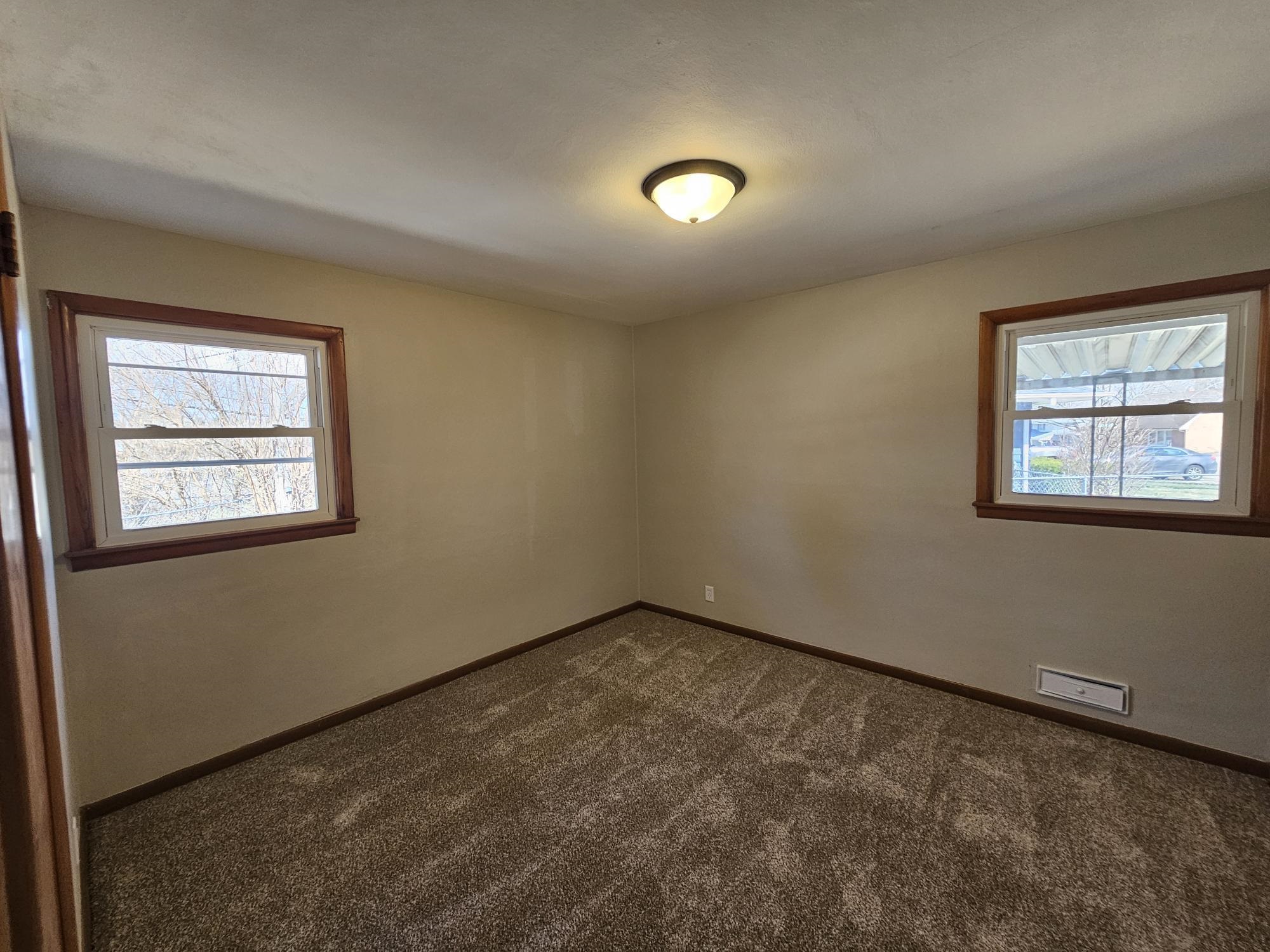 3612 Beach Street Rockford, IL 61108 - Photo 11 of 24 an empty room with a window