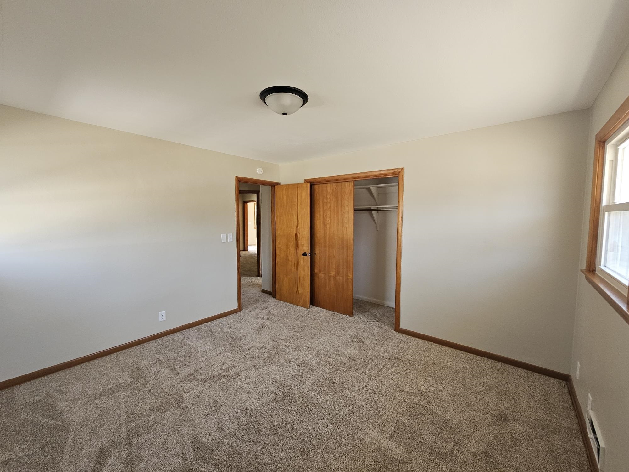 3612 Beach Street Rockford, IL 61108 - Photo 14 of 24 an empty room with windows and closet