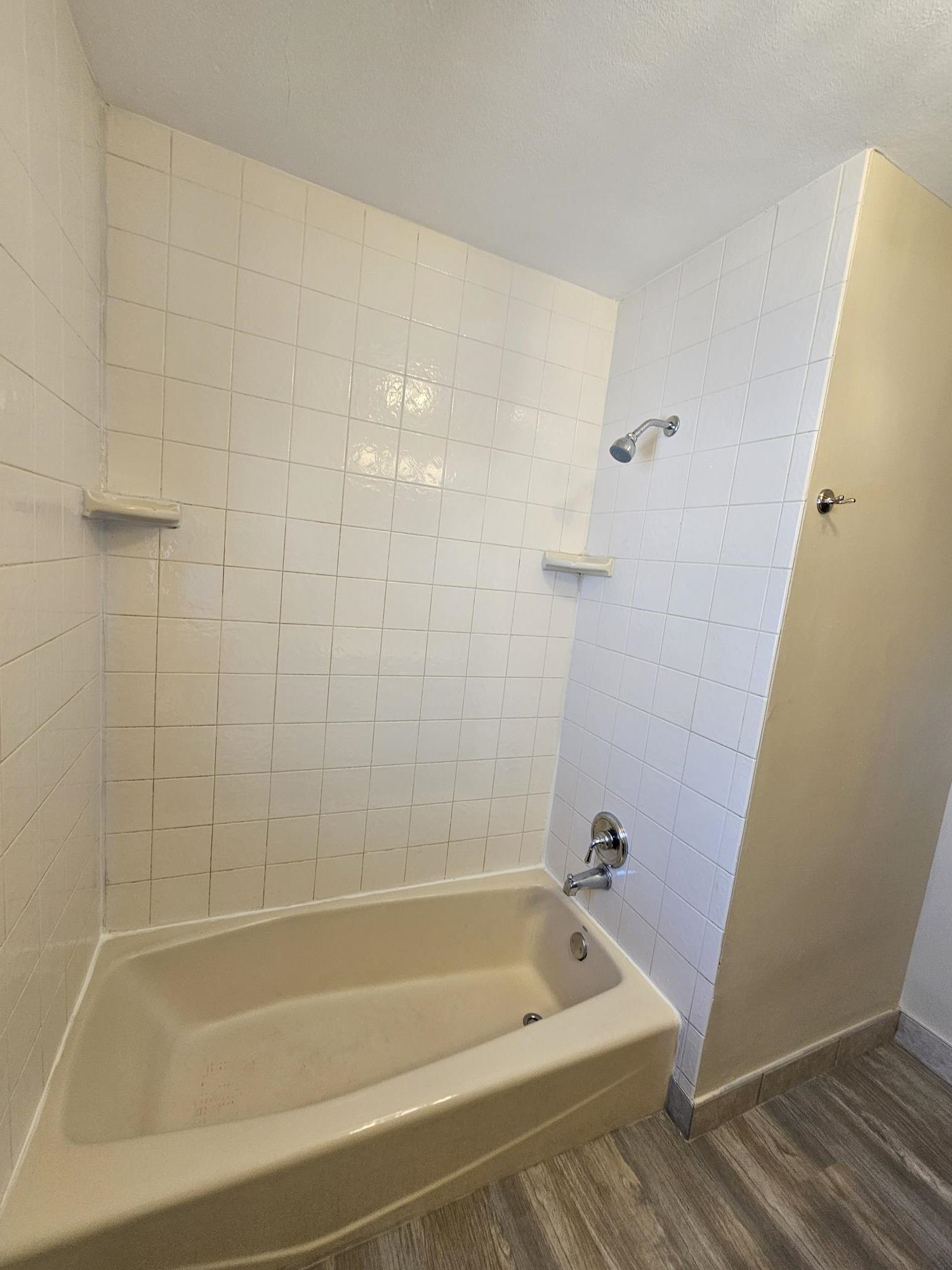 3612 Beach Street Rockford, IL 61108 - Photo 16 of 24 a bathroom with a bathtub