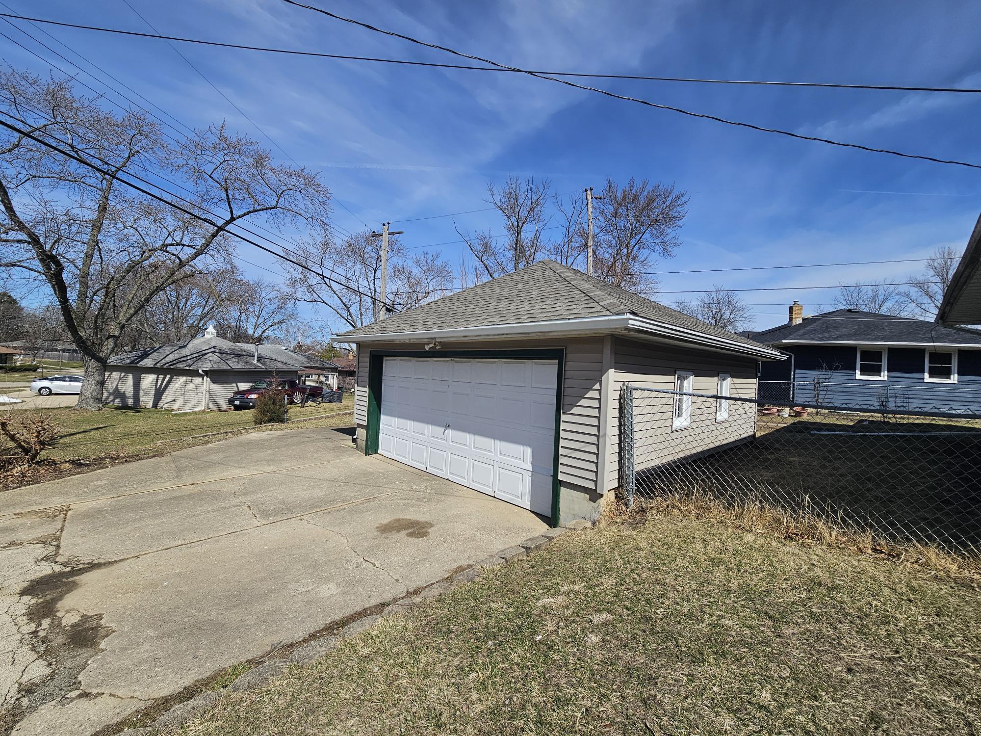 3612 Beach Street Rockford, IL 61108 - Photo 24 of 24 a front view of a house with a yard