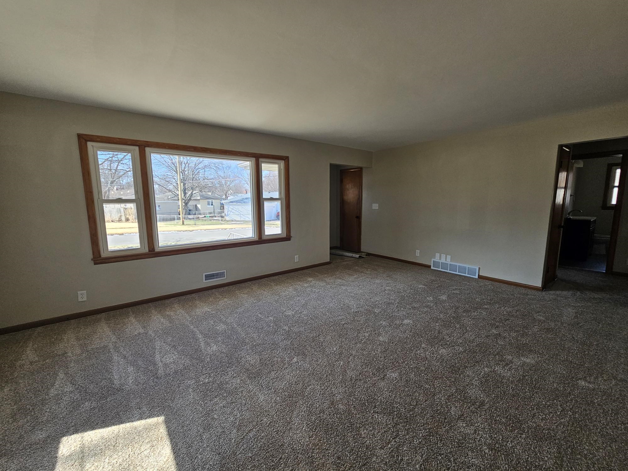 3612 Beach Street Rockford, IL 61108 - Photo 9 of 24 a view of an empty room with a window