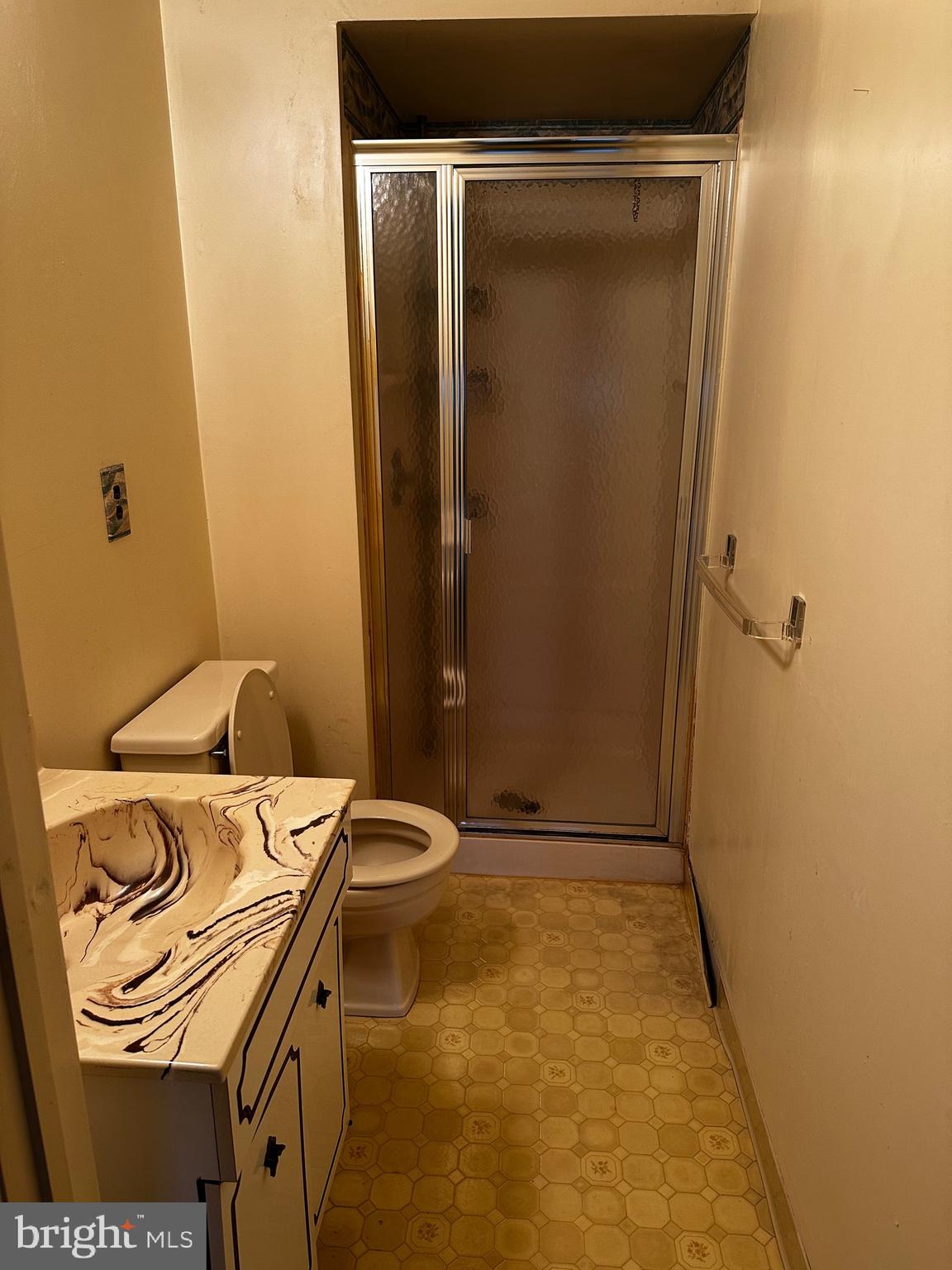6 Kent Place Sewell, NJ 08080 - Photo 11 of 13 a bathroom with a granite countertop sink and a mirror