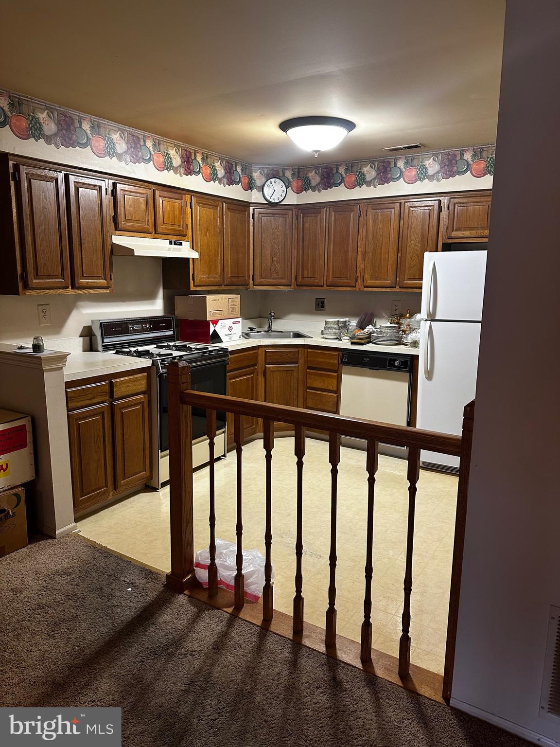 6 Kent Place Sewell, NJ 08080 - Photo 4 of 13 a kitchen with stainless steel appliances granite countertop a stove a sink and a refrigerator