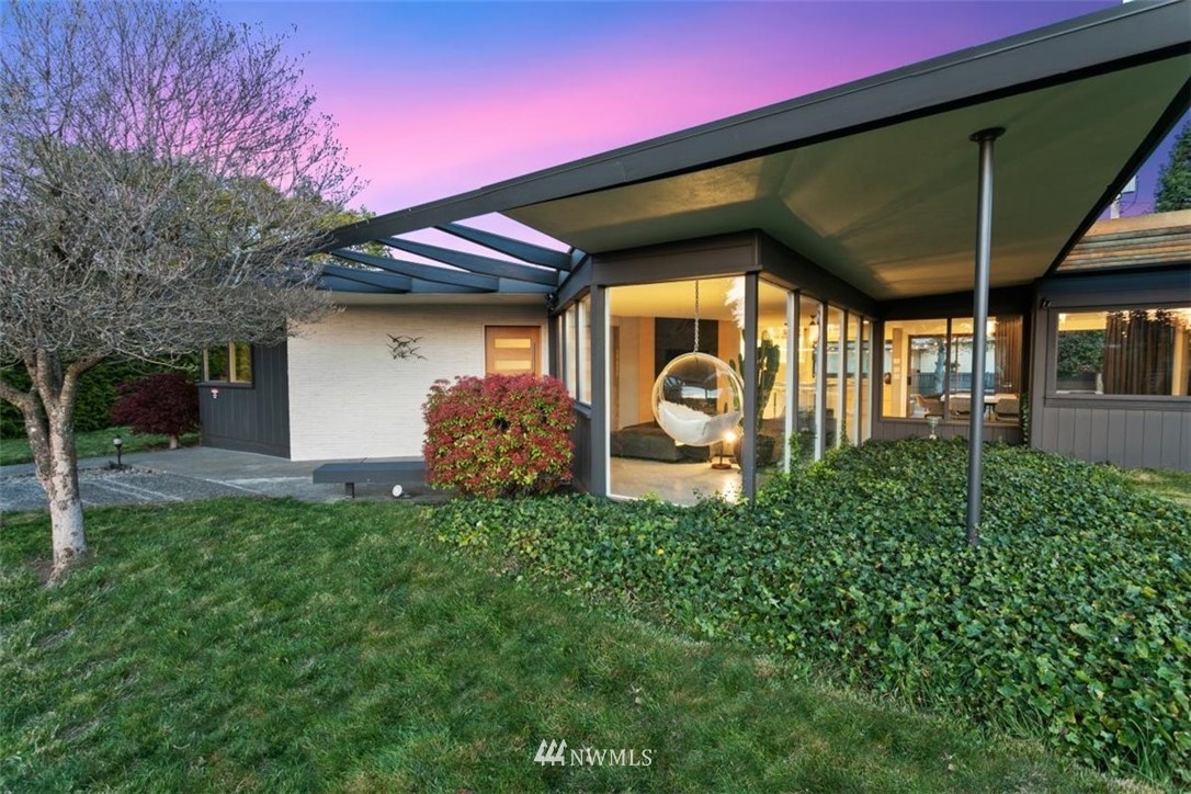 1208 48th Street Southeast Everett, WA 98203 - Photo 2 of 40 a front view of a house with garden