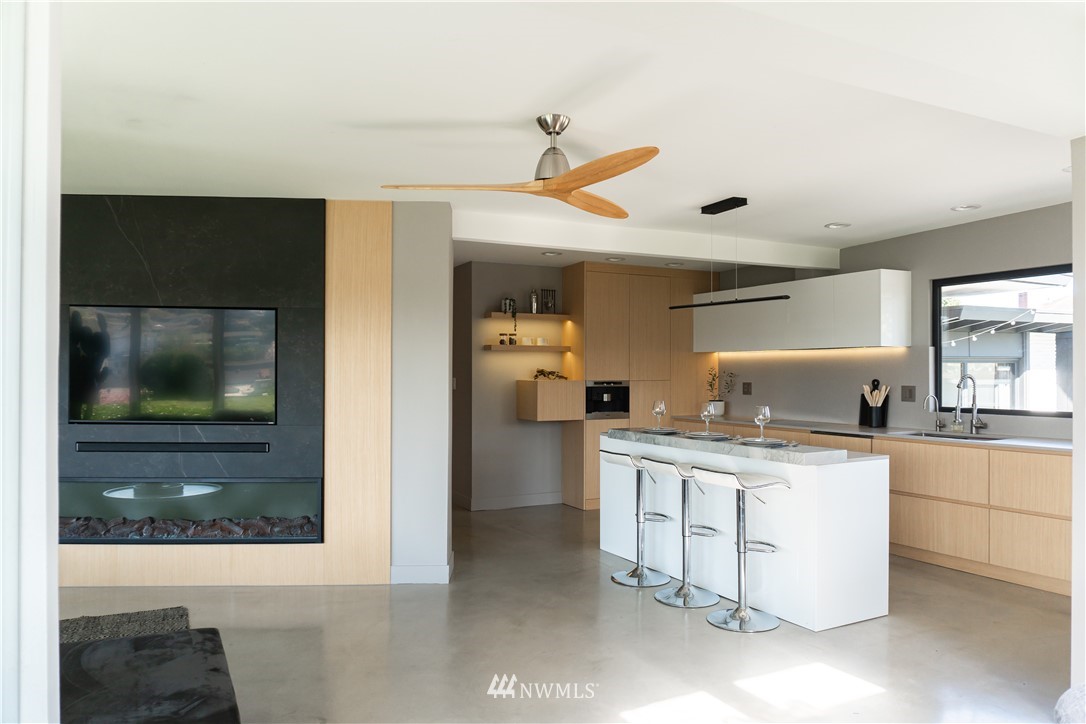 1208 48th Street Southeast Everett, WA 98203 - Photo 11 of 40 a kitchen with a stove a sink and a refrigerator