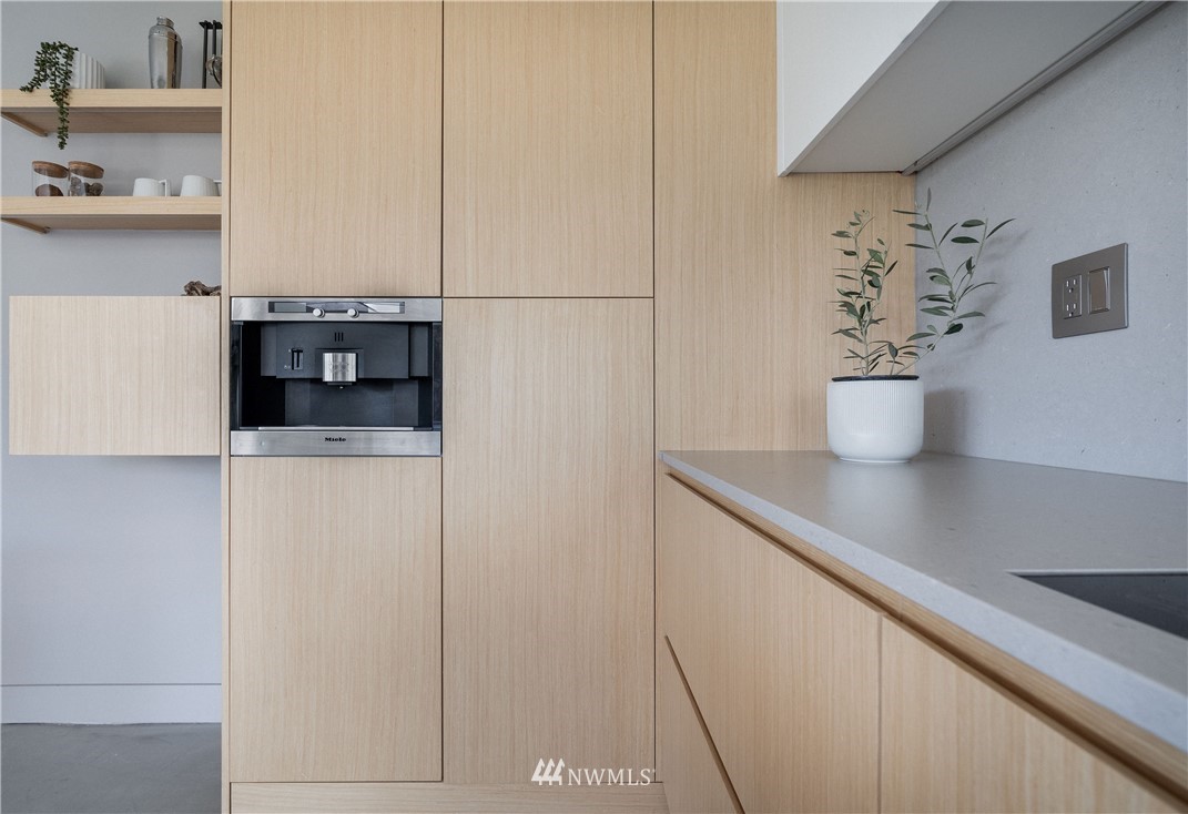 1208 48th Street Southeast Everett, WA 98203 - Photo 15 of 40 a kitchen with a sink and cabinets