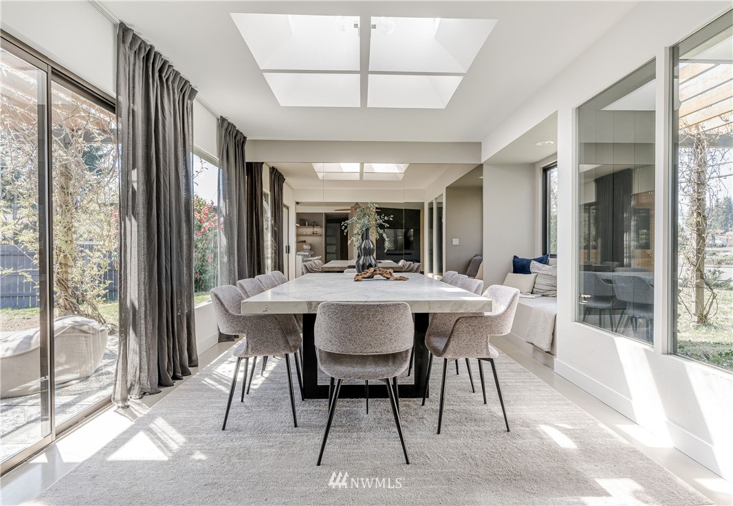 1208 48th Street Southeast Everett, WA 98203 - Photo 17 of 40 a view of a dining room with furniture window and outside view