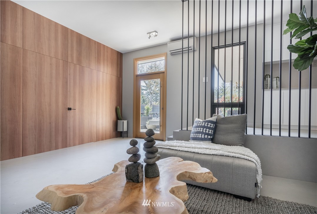 1208 48th Street Southeast Everett, WA 98203 - Photo 19 of 40 a bedroom with furniture and a large window