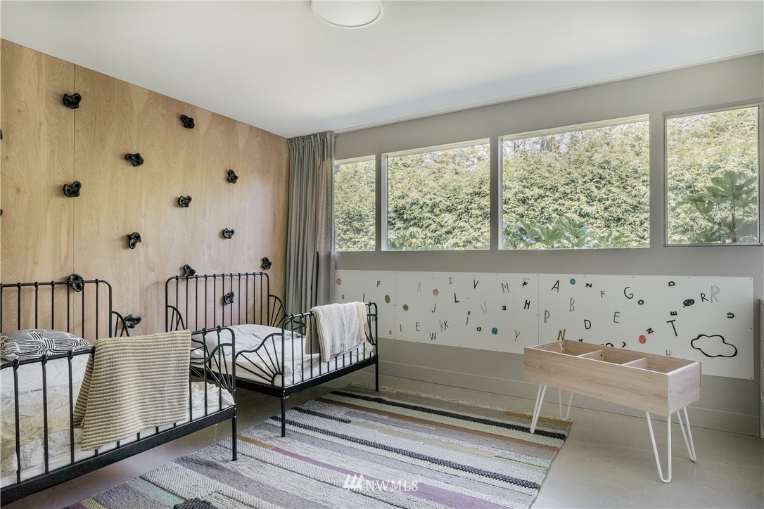 1208 48th Street Southeast Everett, WA 98203 - Photo 26 of 40 a living room with furniture and a window