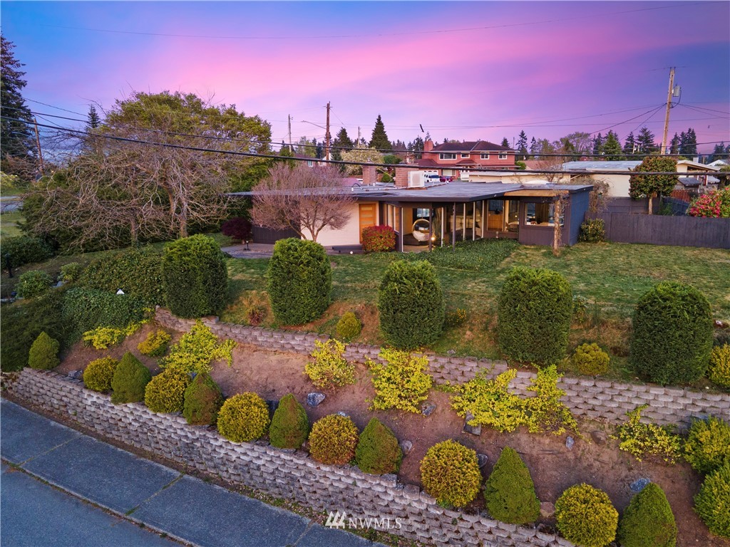 1208 48th Street Southeast Everett, WA 98203 - Photo 40 of 40 a view of a chairs and table in a backyard