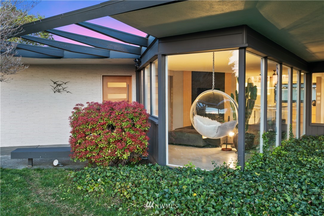 1208 48th Street Southeast Everett, WA 98203 - Photo 5 of 40 a front view of a house with garden