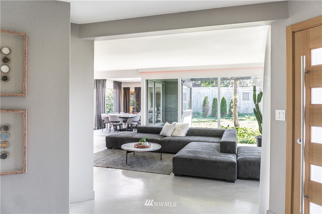 1208 48th Street Southeast Everett, WA 98203 - Photo 7 of 40 a living room with furniture and a large window