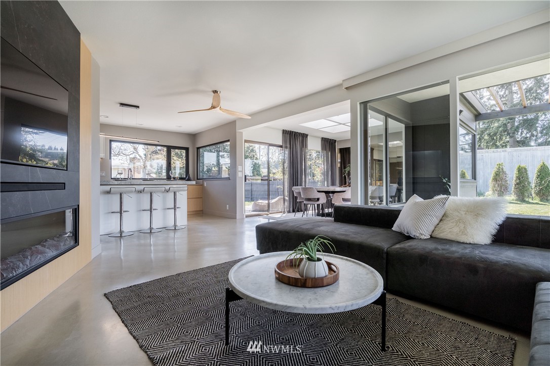 1208 48th Street Southeast Everett, WA 98203 - Photo 8 of 40 a living room with furniture and a fireplace