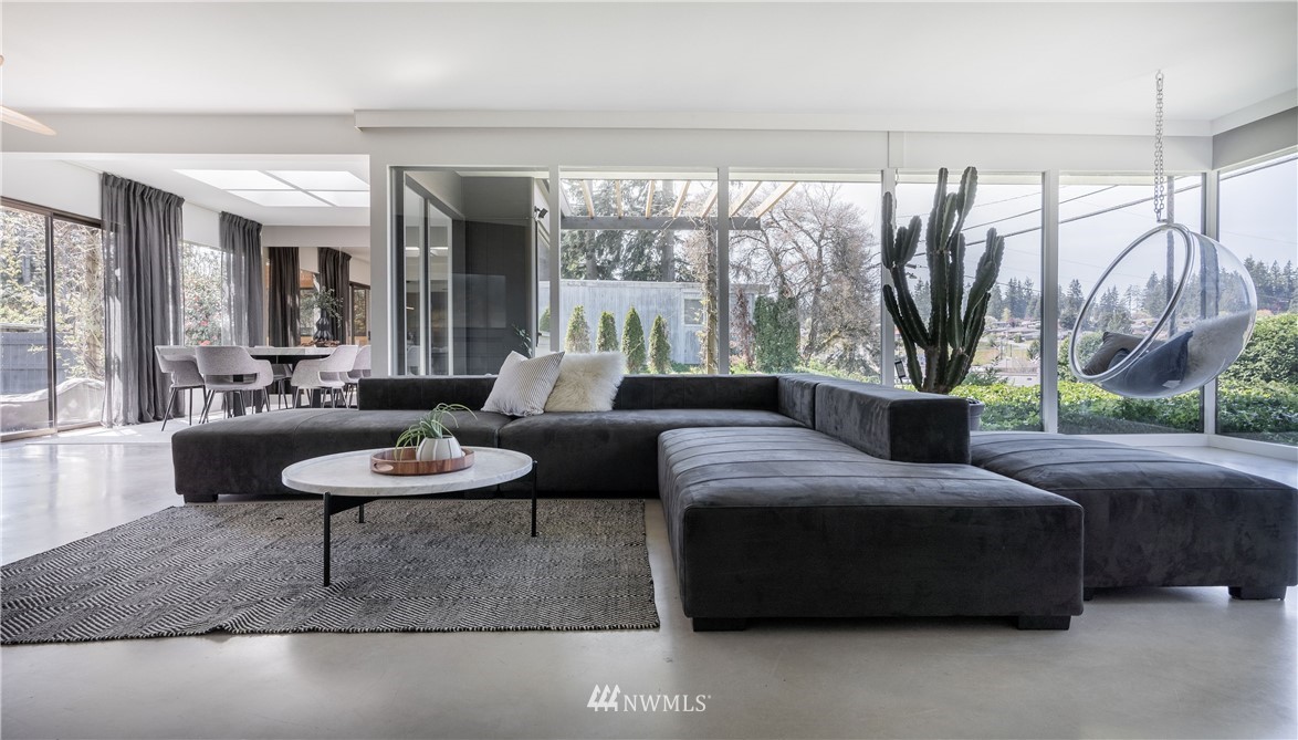 1208 48th Street Southeast Everett, WA 98203 - Photo 9 of 40 a living room with furniture and a large window