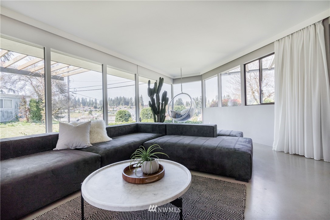 1208 48th Street Southeast Everett, WA 98203 - Photo 10 of 40 a living room with furniture and a large window