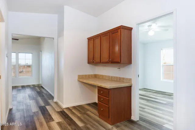 a hallway with washer and dryer