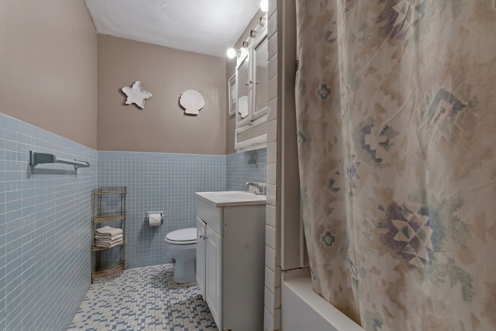 49 Francine Road Raynham, MA 02767 - Photo 12 of 31 a bathroom with a toilet and a shower