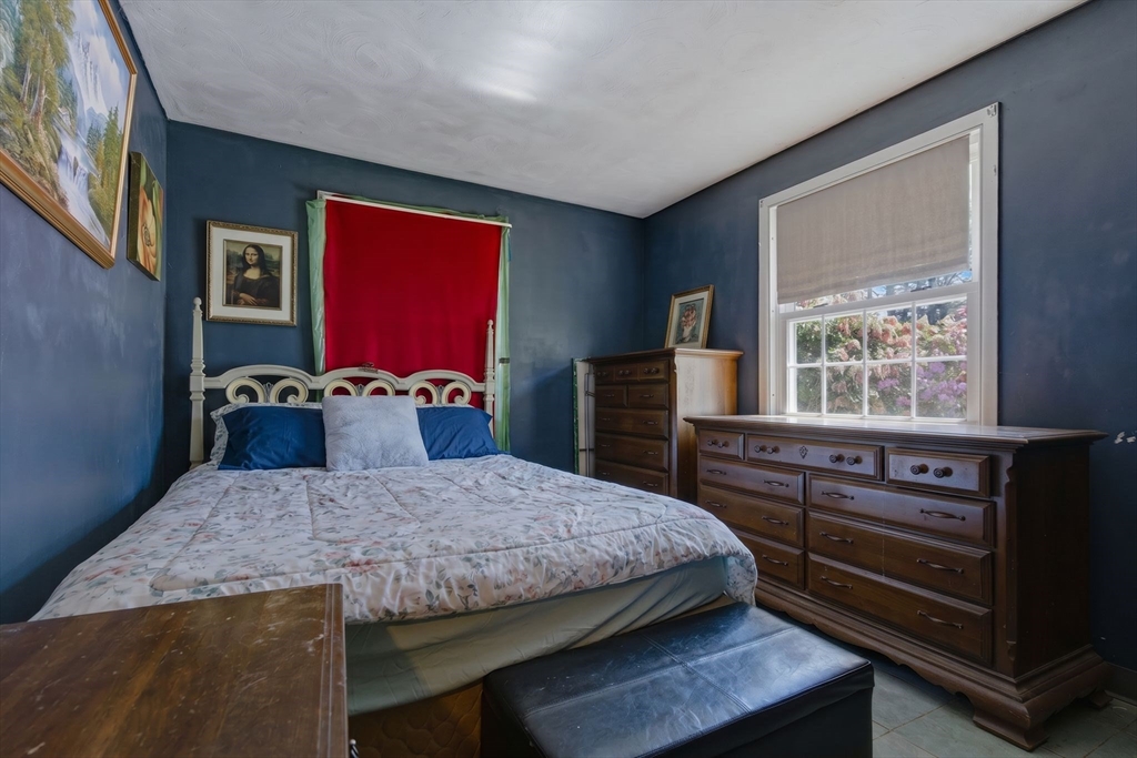 49 Francine Road Raynham, MA 02767 - Photo 13 of 31 a bedroom with a bed and wooden floor