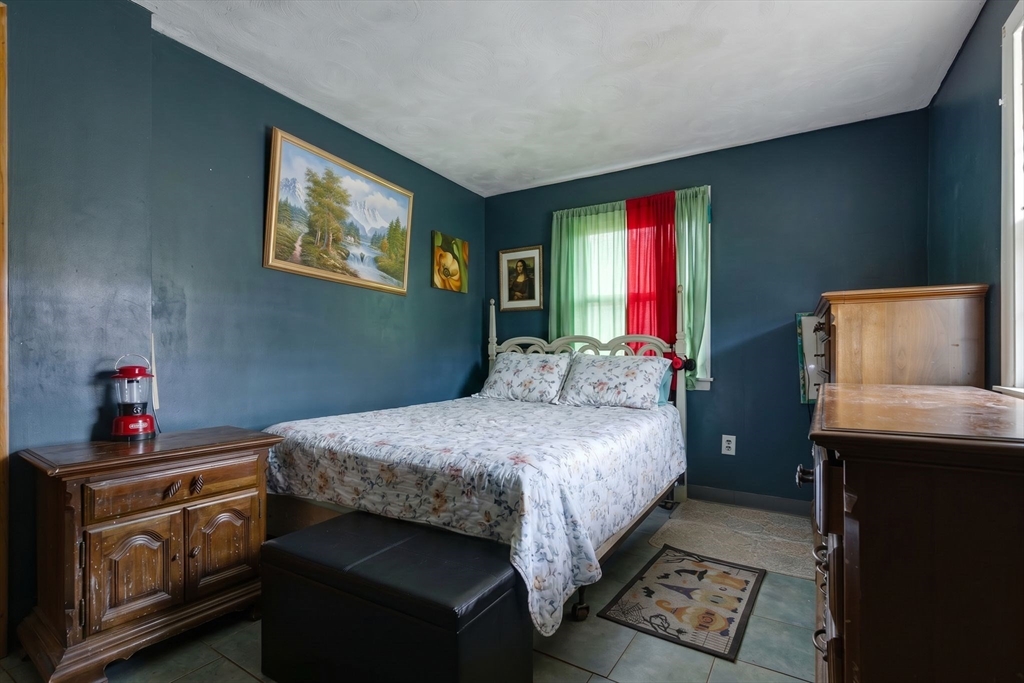 49 Francine Road Raynham, MA 02767 - Photo 14 of 31 a bedroom with a bed and a dresser next to it