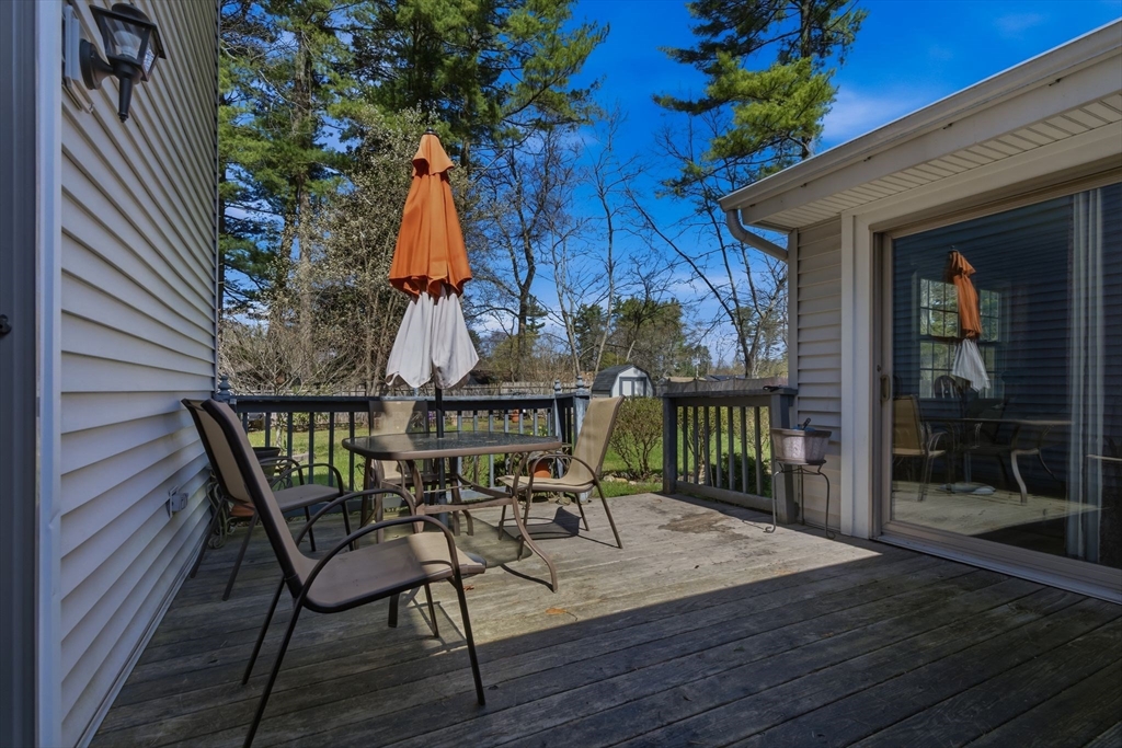 49 Francine Road Raynham, MA 02767 - Photo 24 of 31 a view of a chairs and bench in patio of the house