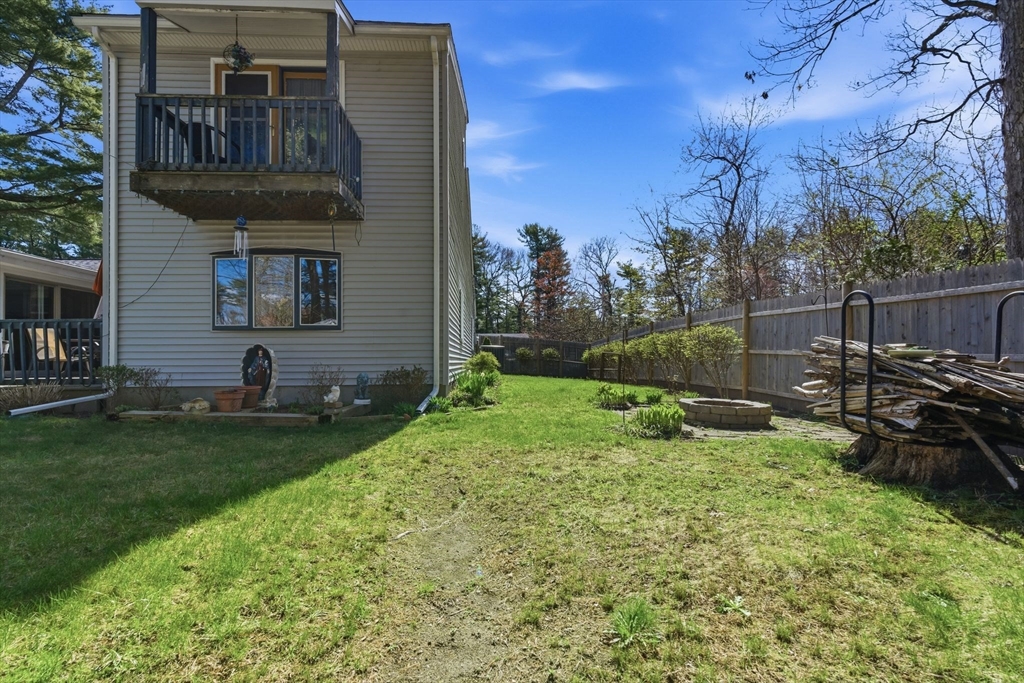 49 Francine Road Raynham, MA 02767 - Photo 26 of 31 a view of a house with backyard and sitting area