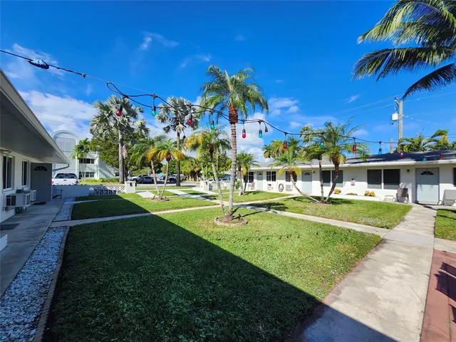 a view of a swimming pool with a garden