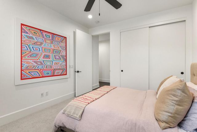 a view of a house with garden and a swimming pool