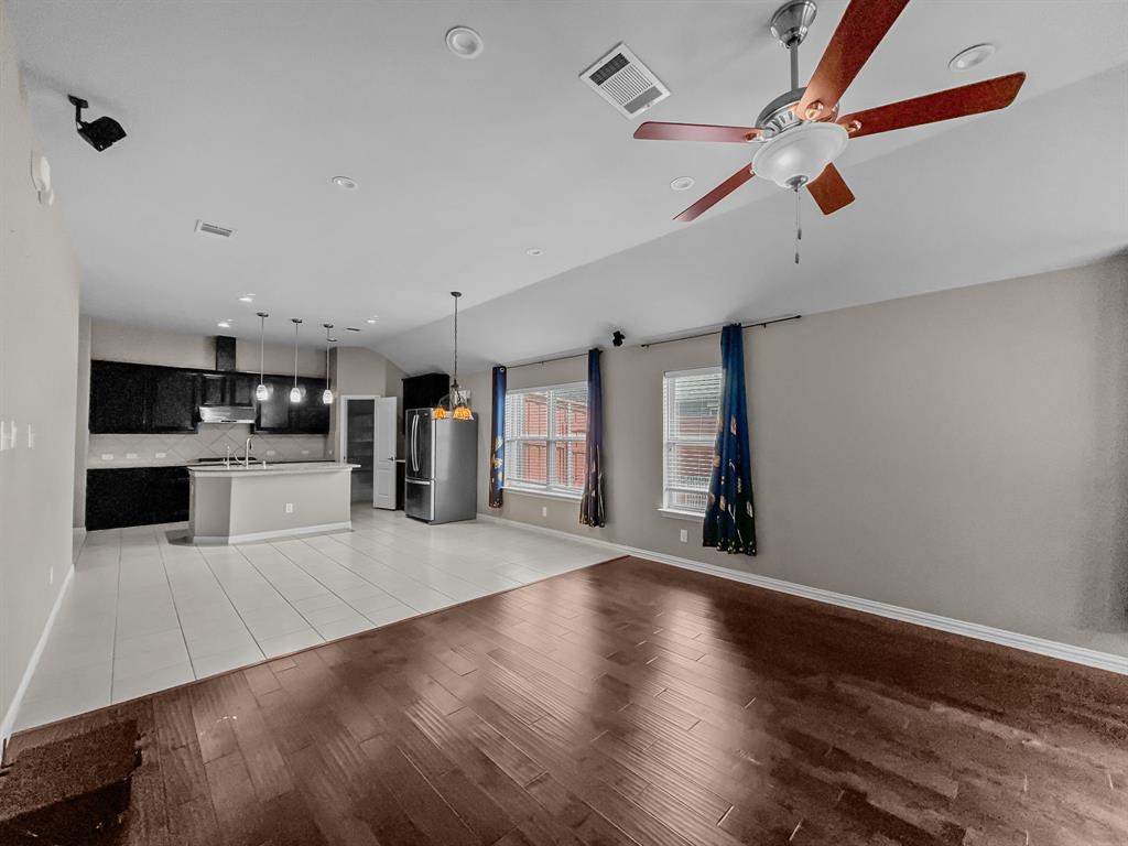 3205 Ridgeway Drive McKinney, TX 75071 - Photo 7 of 27 a view of a kitchen with a sink and a window