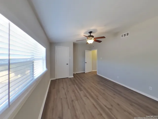 a bathroom with a mirror and a sink