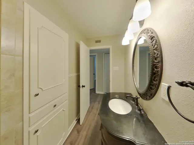 a bathroom with a shower and a bathtub
