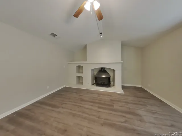 a view of empty room with washer and dryer