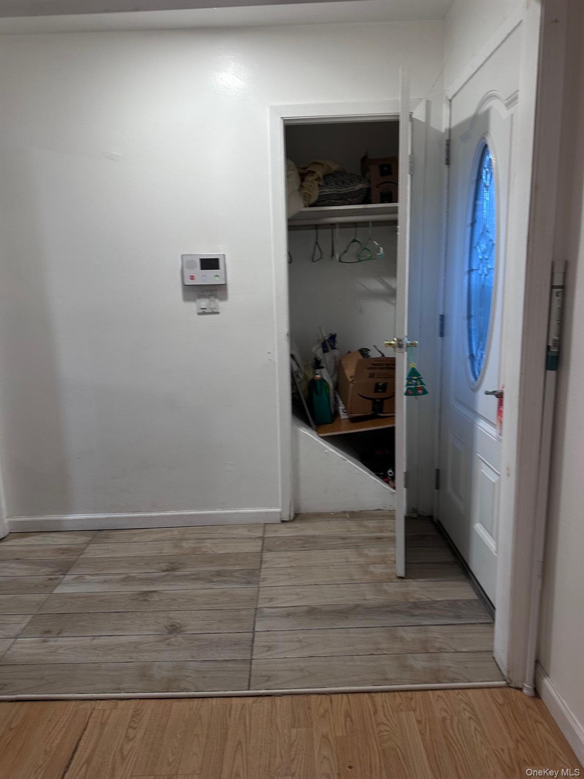 20 Broadway Mastic, NY 11950 - Photo 4 of 11 a view of an entryway