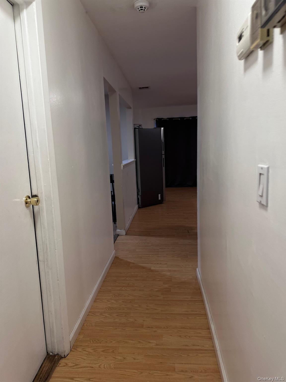 20 Broadway Mastic, NY 11950 - Photo 8 of 11 a view of hallway