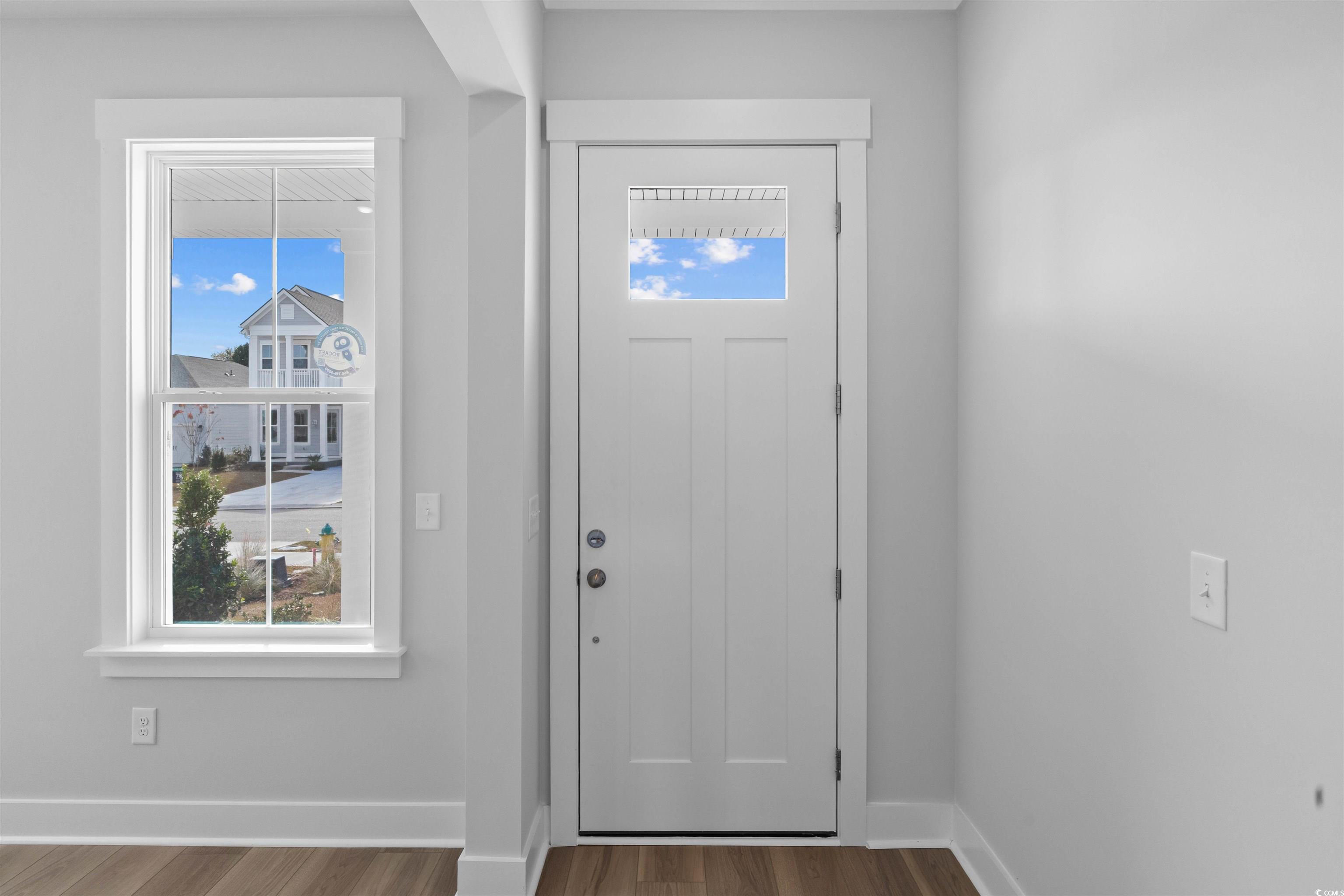 220 Atlantic Breeze Street Myrtle Beach, SC 29572 - Photo 16 of 38 Entryway with wood finished floors and baseboards