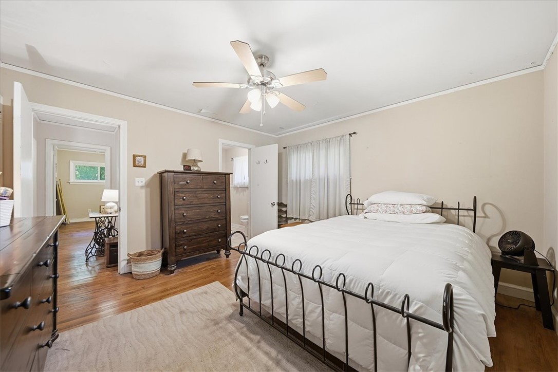 504 Jeb Stuart Avenue Anderson, SC 29621 - Photo 29 of 47 This inviting bedroom offers comfort and classic appeal with hardwood flooring and ample natural light.