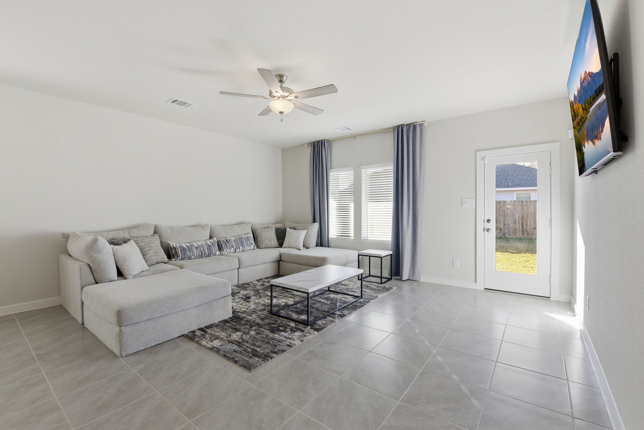 18623 Frost Ridge Drive Crosby, TX 77532 - Photo 17 of 40 a living room with furniture and a flat screen tv