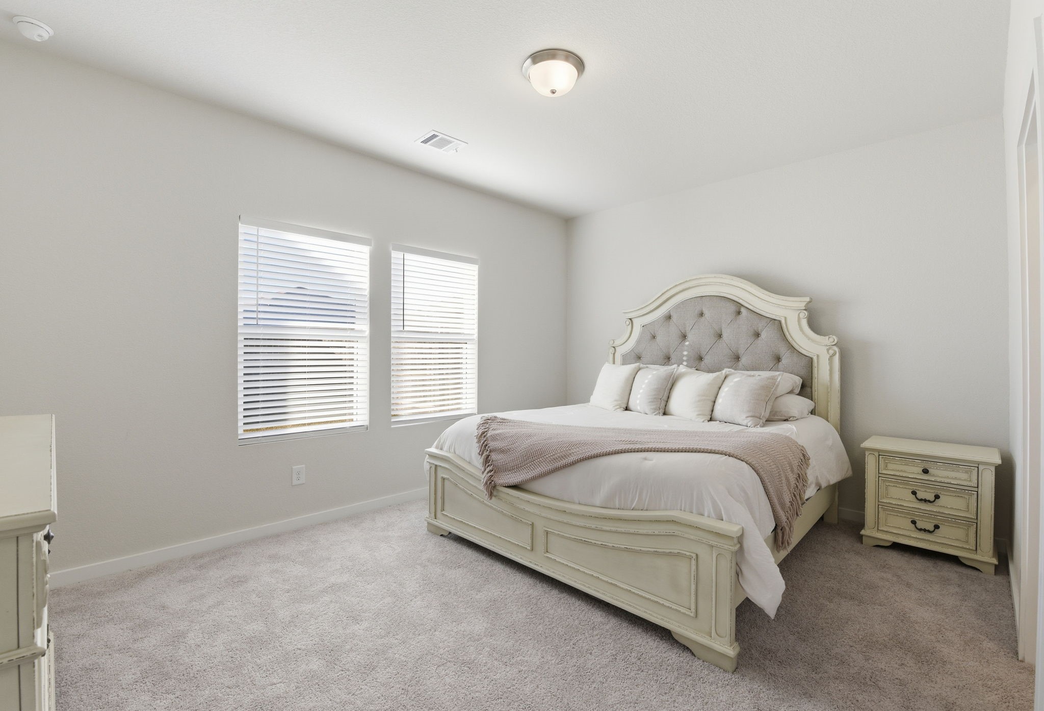 18623 Frost Ridge Drive Crosby, TX 77532 - Photo 19 of 40 a spacious bedroom with a bed and a window
