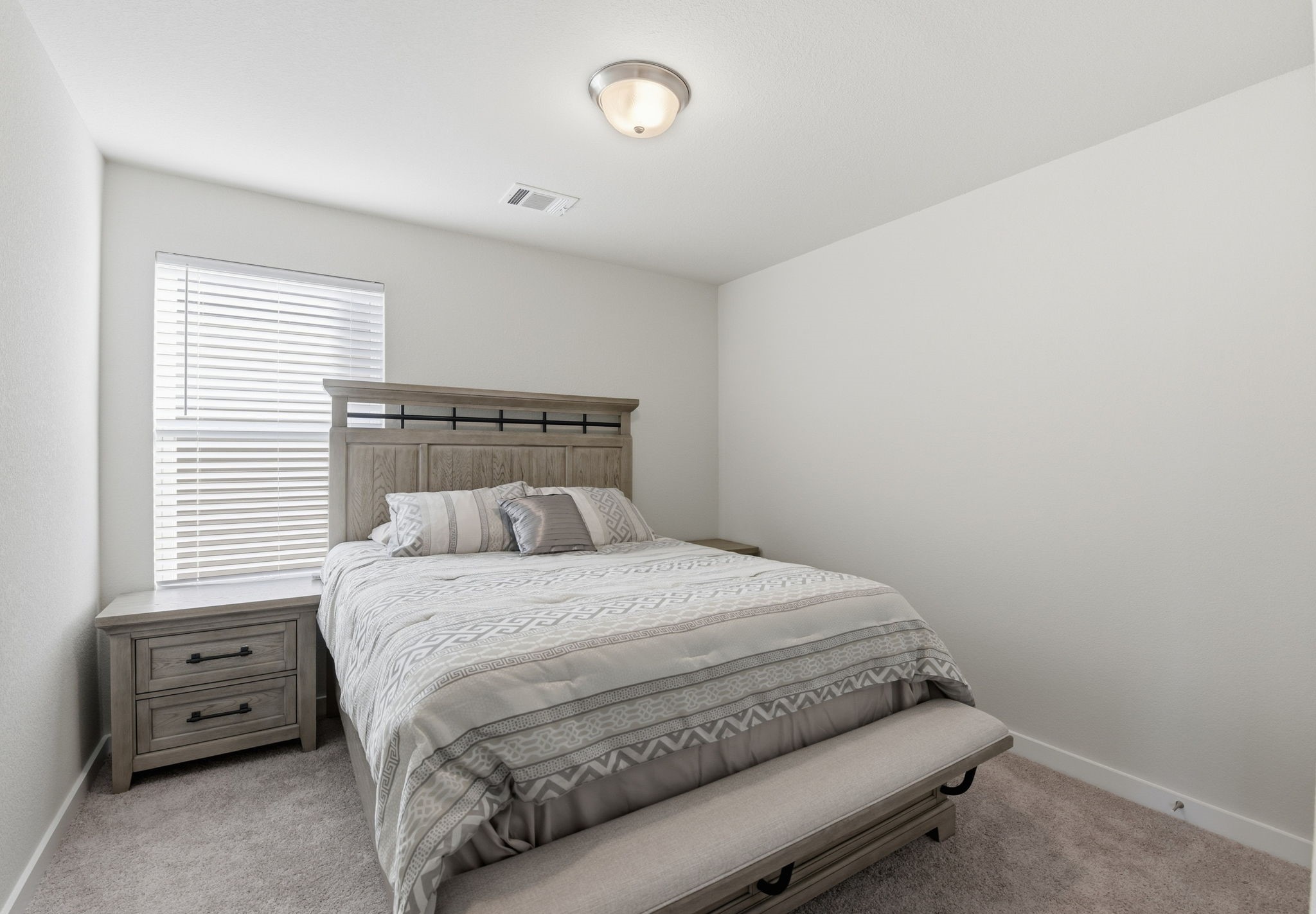 18623 Frost Ridge Drive Crosby, TX 77532 - Photo 30 of 40 a bedroom with a bed and a window