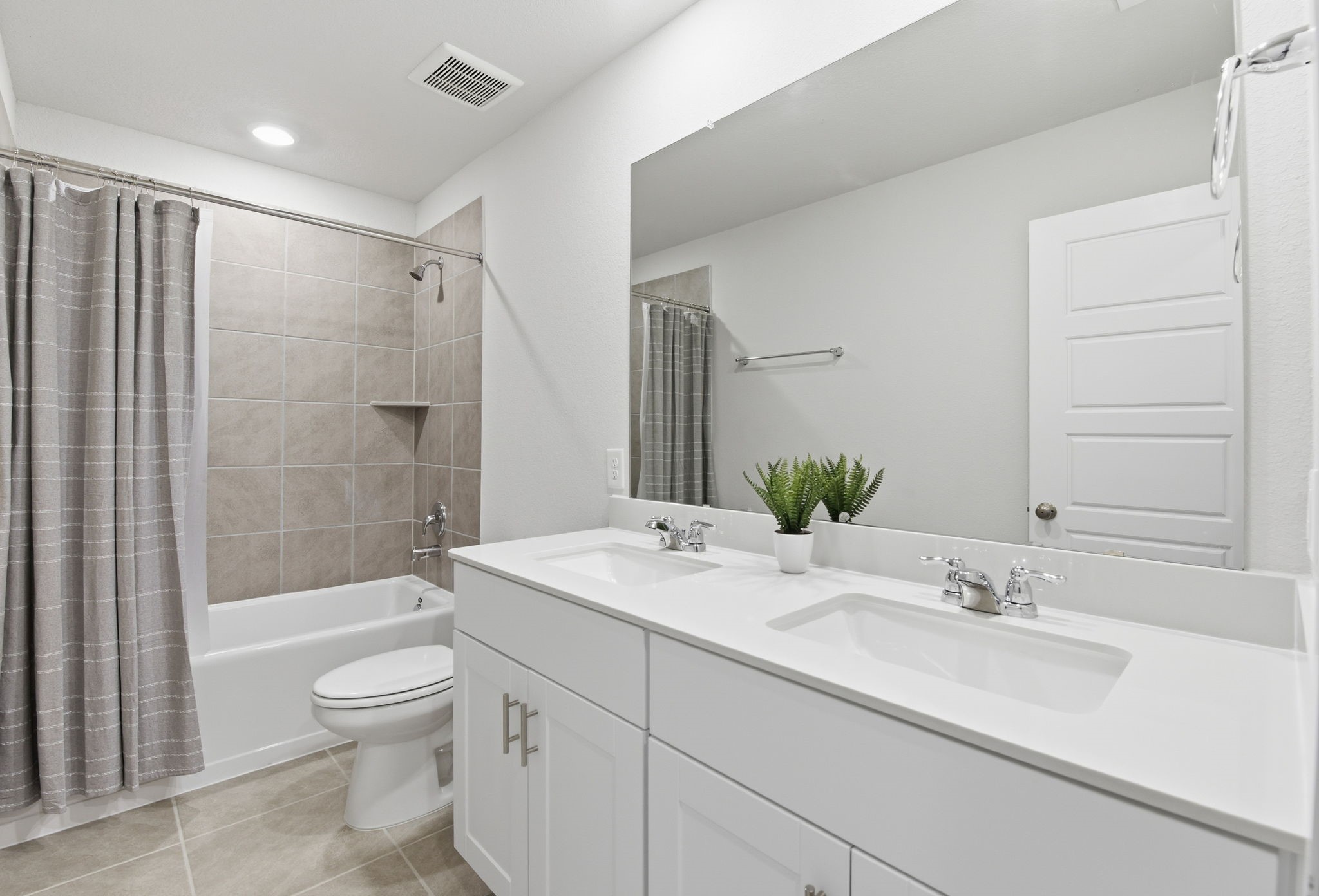 18623 Frost Ridge Drive Crosby, TX 77532 - Photo 34 of 40 a bathroom with a sink a toilet and shower
