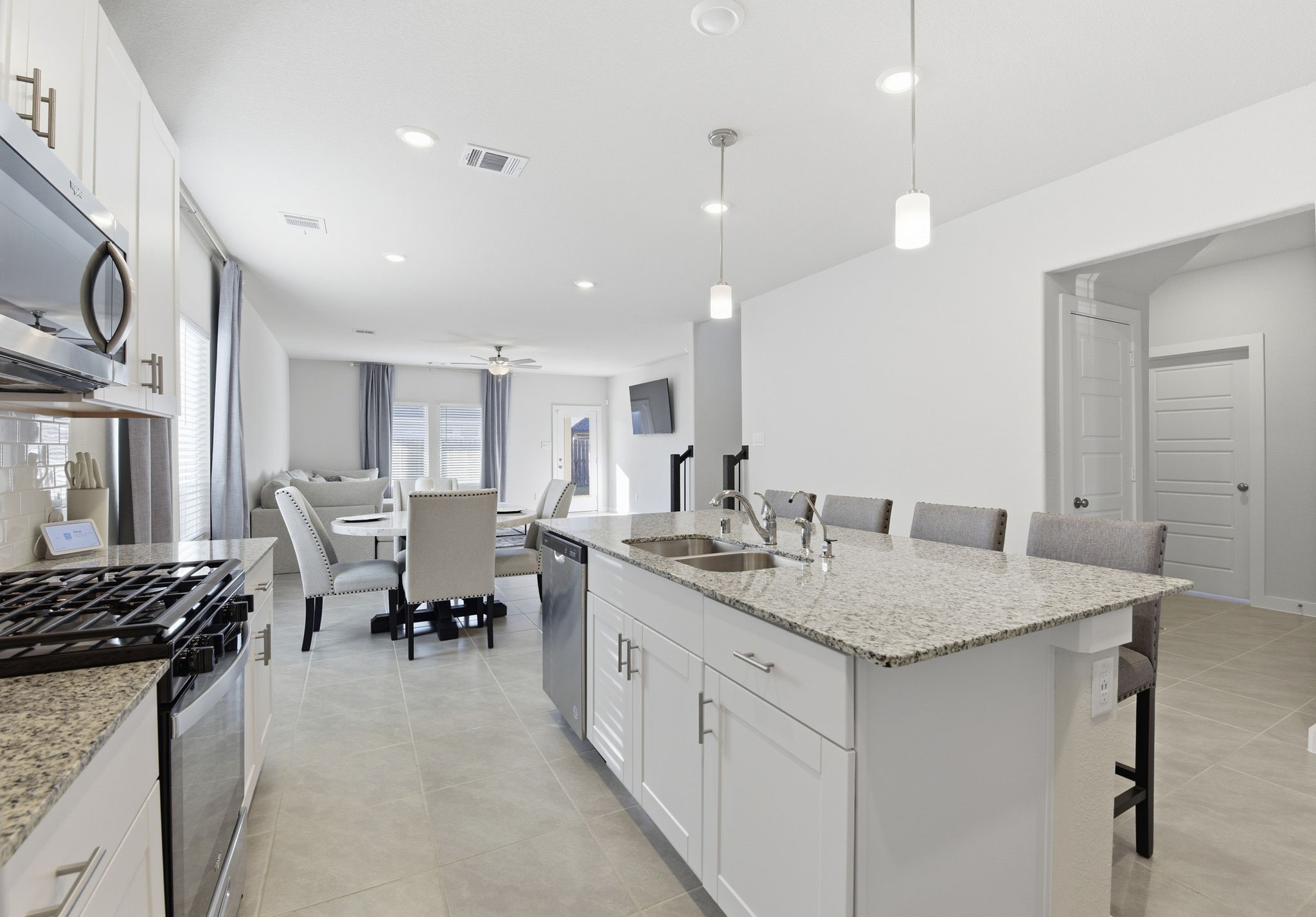 18623 Frost Ridge Drive Crosby, TX 77532 - Photo 6 of 40 a kitchen with sink and cabinets