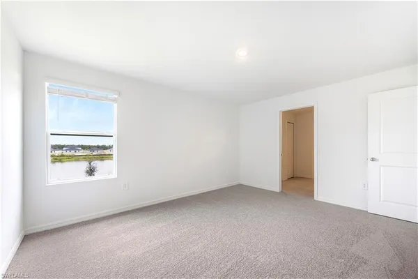 a bathroom with a granite countertop sink mirror and