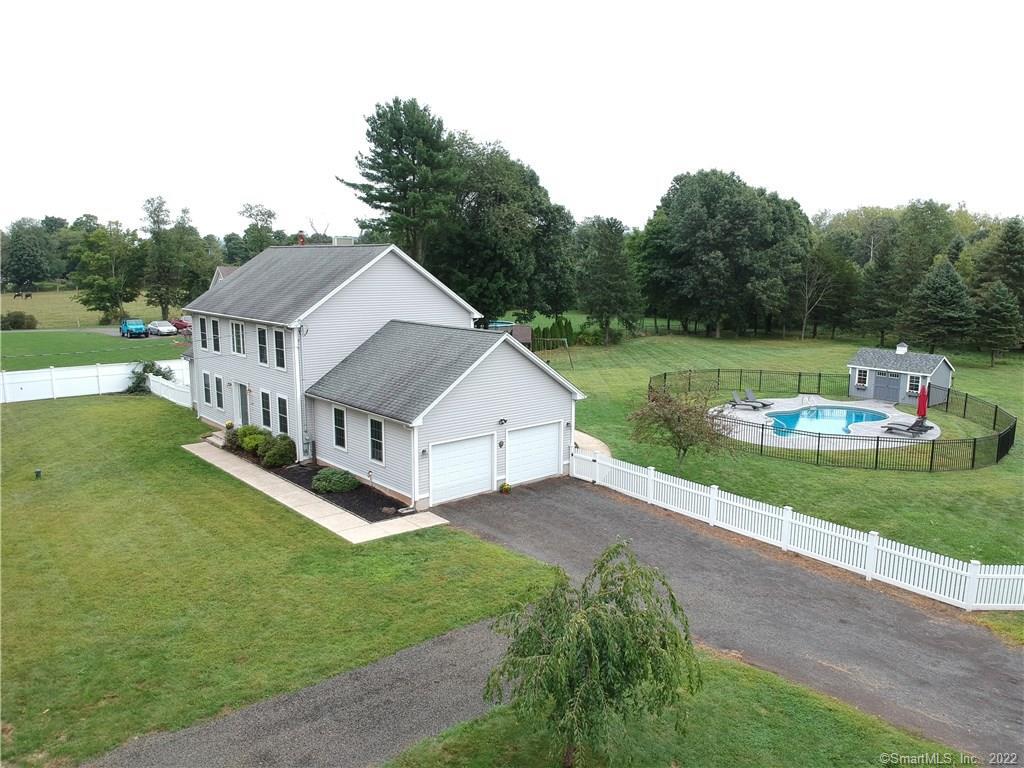 1042 North Farms Road Wallingford, CT 06492 - Photo 1 of 1 Country Colonial with 1st floor master suite, open floor plan and almost an acre of land!